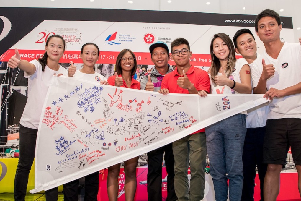 Local water sports athletes cheer for the first Hong Kong team during the countdown for the Volvo Ocean Race 2017-2018 at Harbour City. Photos: Ike Images