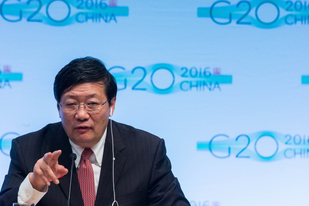 A file picture of former finance minister Lou Jiwei speaking at a G20 press conference in Washington last year. Photo: AFP