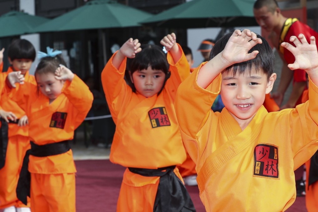 Kids from St Paul's Church Kindergarten strut their kung fu stuff. Photo: Edward Wong