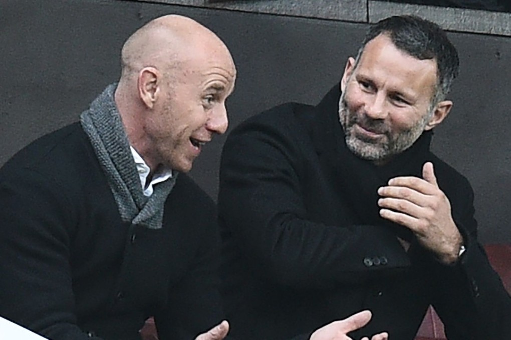 Ryan Giggs (R), pictured with former teammate Nicky Butt, says he is open to the vacant manager jobs at Everton and Leicester City. Photo: AFP