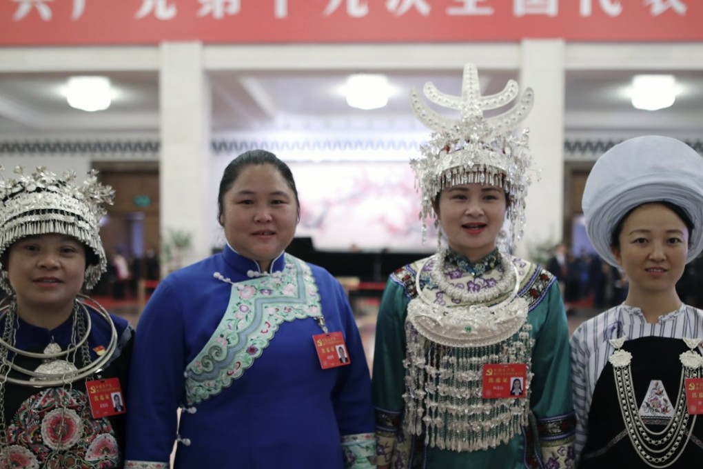 A group of female minority delegates at the congress. The event has a record number of female delegates – but not in the upper echelons of the Communist Party. Photo: EPA
