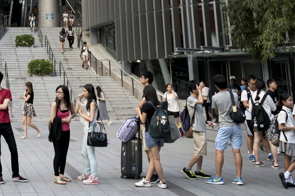 The Housing Society chairman wants to discuss with the government whether students can be considered a separate category from those in the public housing queue. Photo: AFP