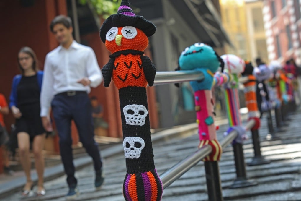 Yarn bombing in full effect on Pottinger Street in Central. Photo: Sam Tsang