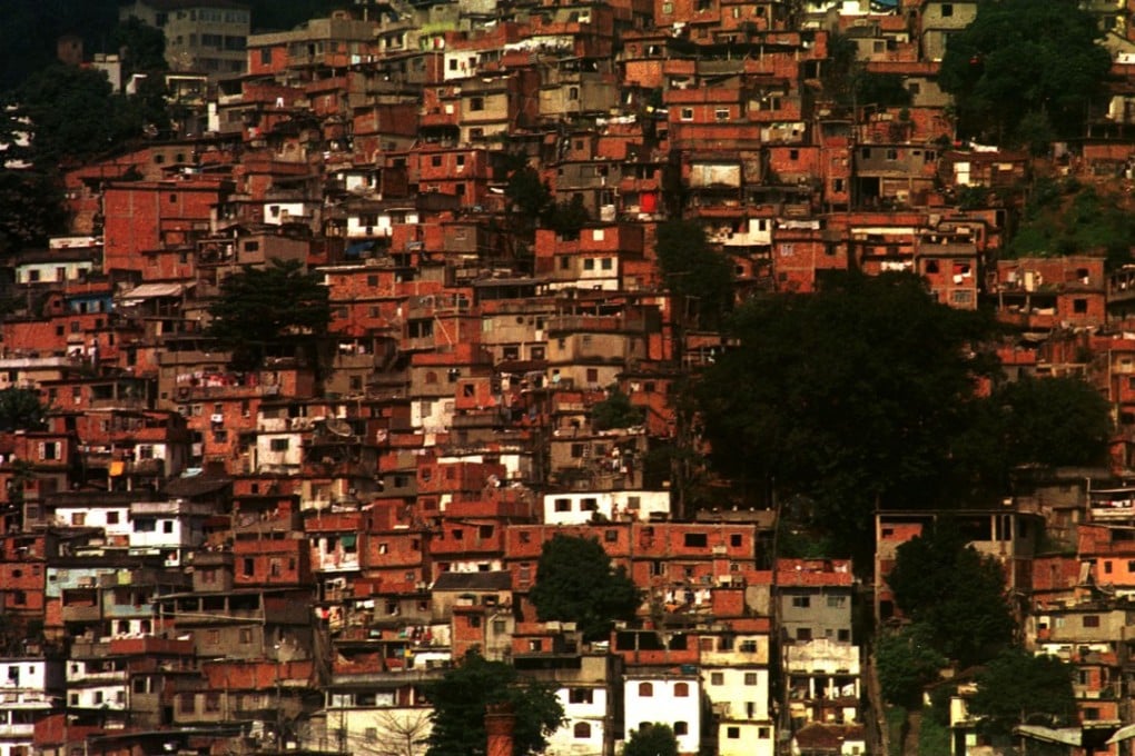 Rio de Janeiro’s average monthly take-home pay of US$640 cannot cover a rental even on the outskirts of town, which could explain why more than one in five Rio residents lived in informal shanty towns called favelas in 2010. Photo: AP