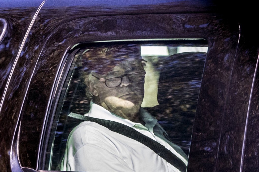US President Donald Trump leaving his golf course in Virginia on Sunday. Photo: AP
