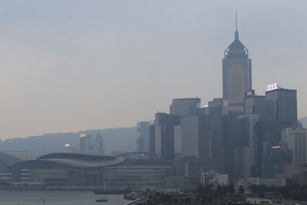 Iconic Hong Kong landmarks are seen cloaked in smog on September 12. Photo: Dickson Lee