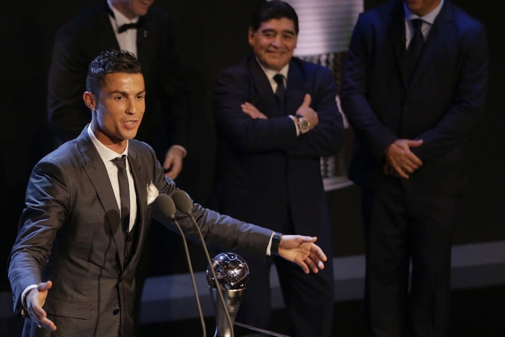 Legend Diego Maradona presents Cristiano Ronaldo with the Best Fifa Men’s player award. Photo: AP