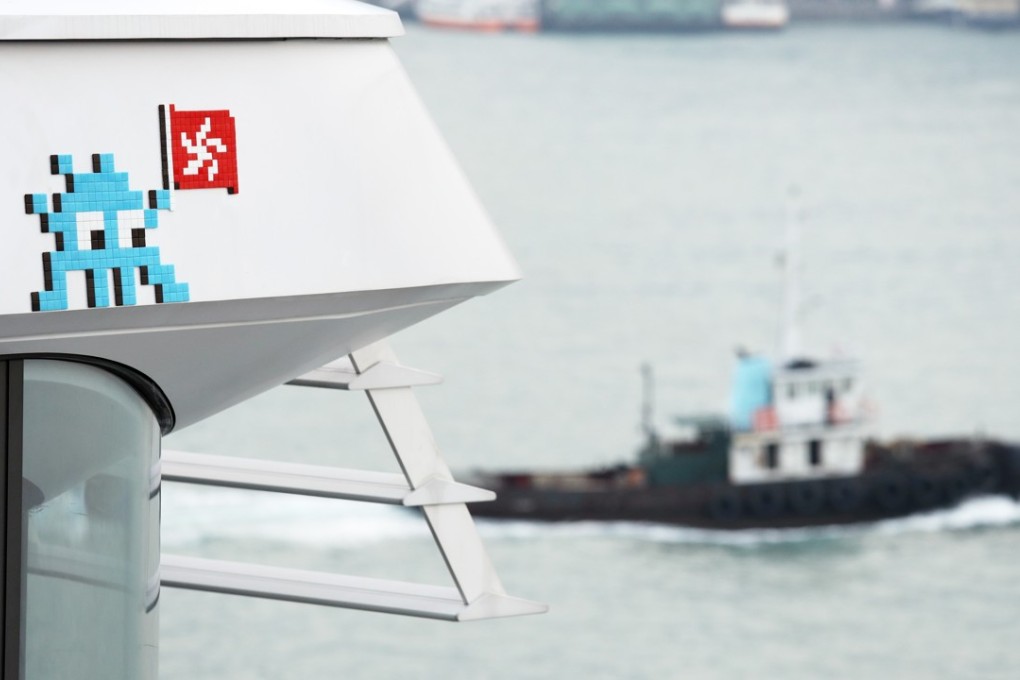 The French artist Invader was praised for his artwork at Harbour City by teh shopping centre’s management. Photo: K.Y. Cheng