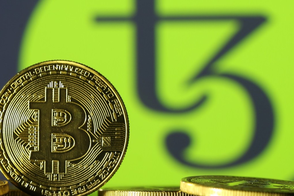 Photo illustration shows copies of bitcoin. Singapore said it will not regulate cryptocurrencies like bitcoin at this time. Photo: Reuters