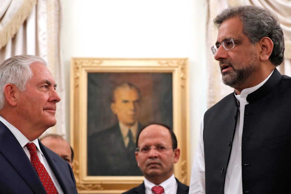 US Secretary of State Rex Tillerson is greeted by Pakistani Prime Minister Shahid Khan Abbasi. Photo: AFP