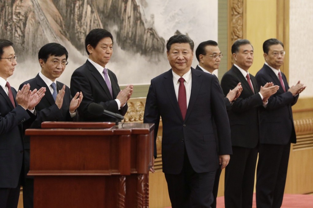 China’s President Xi Jinping (centre) is flanked by his fellow members of the elite Politburo Standing Committee. They are:(from left) Han Zheng, Wang Huning, Li Zhanshu, Li Keqiang, Wang Yang and Zhao Leji. Photo: Bloomberg.