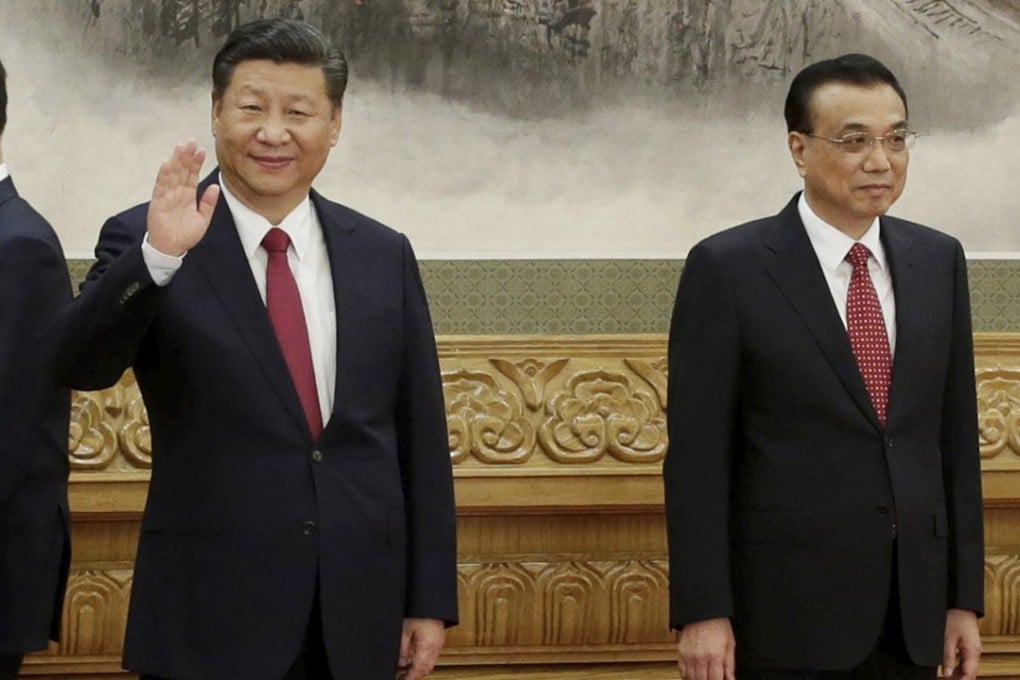 President Xi Jinping and Premier Li Keqiang are the only two people to retain their seats on the Politburo Standing Committee. Photo: Reuters