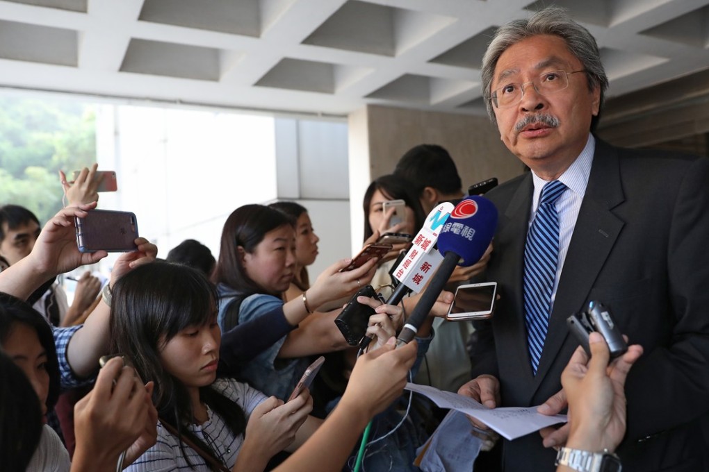 Former financial secretary John Tsang speaks outside the High Court on Thursday. Photo: Sam Tsang