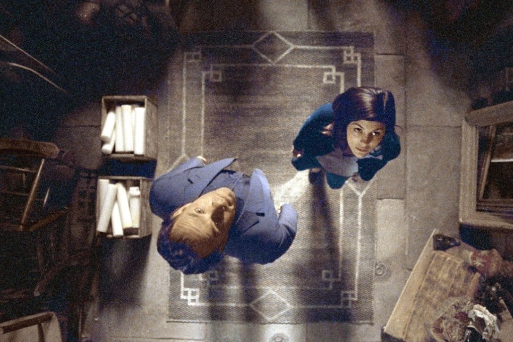 Tom Hanks, as Robert Langdon, with Audrey Tautou, in the 2006 film The Da Vinci Code.