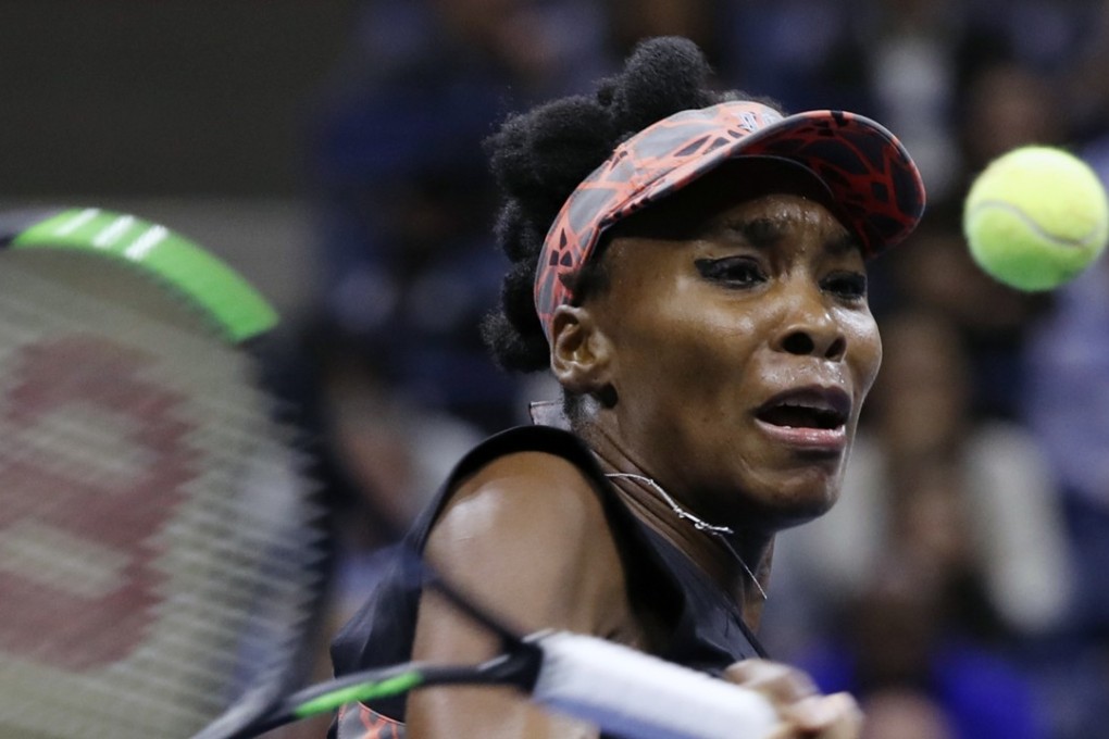 Venus Williams was in no mood for talk as she dispatched Garbine Muguruza to reach the semi-finals of the WTA Finals. photo: AP
