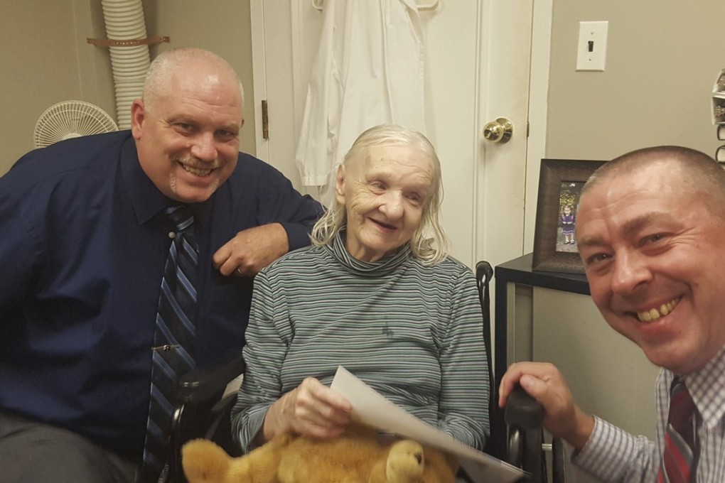 This photo provided by the Sullivan County Sheriff's Office shows Flora Harris with Sullivan County Sheriff’s Detective Ed Clouse, left, and Detective Rich Morgan, right, at the assisted living residence in Lowell, Massachusetts, where they found her. Photo: AP