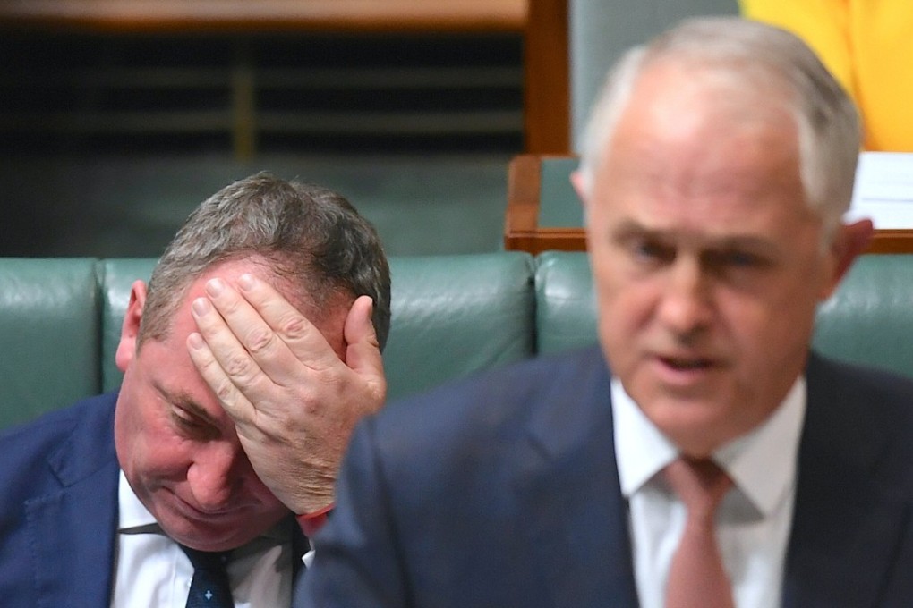 Australian Deputy Prime Minister Barnaby Joyce and Prime Minister Malcolm Turnbull in the House of Representatives in Canberra. Photo: Reuters
