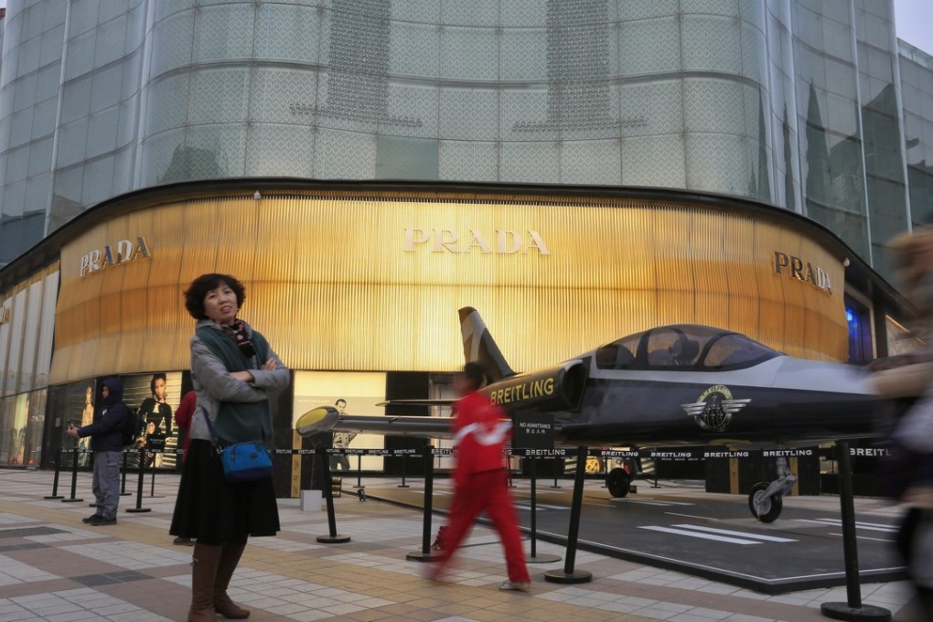A Prada store in Beijing. Luxury brands have rushed to open stores in China. Photo: EPA