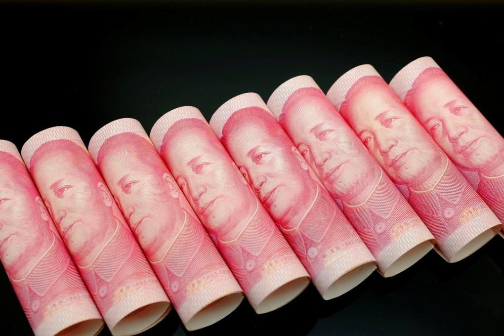 China will loosen grip on the yuan at a time of its own choosing. Photo: Reuters