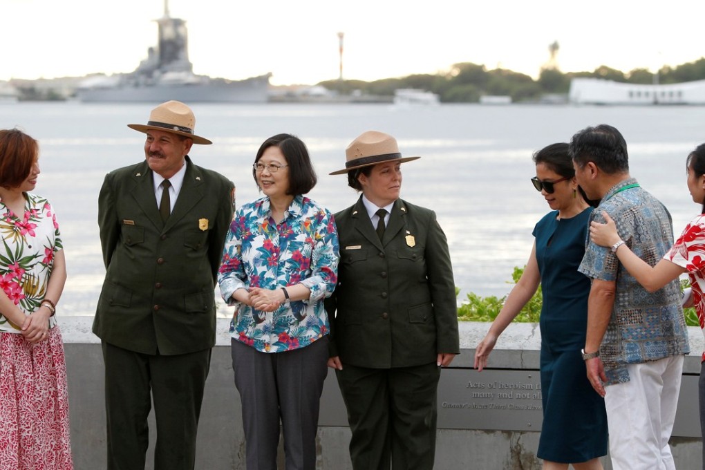 Taiwanese President Tsai Ing-wen, flanked by two US National Park rangers, stopped in Hawaii en route to her allies in the Pacific. Photo: Reuters