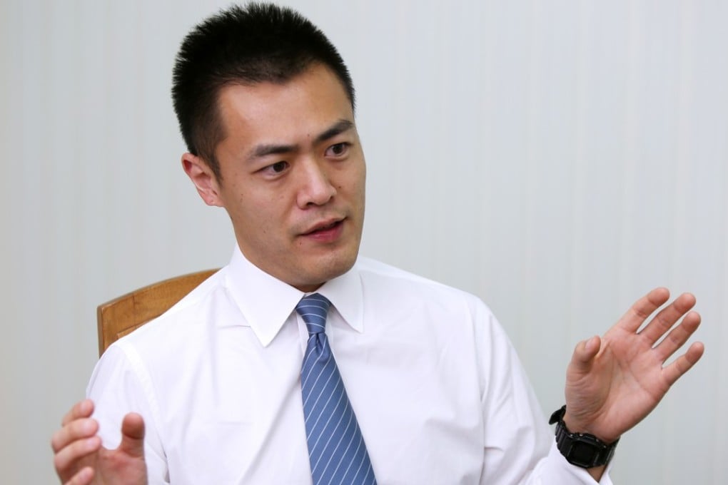 Lau Ming-wai advised the young analysts joining the policymaking bodies to put away their political stances and personal biases. Photo: Xiaomei Chen