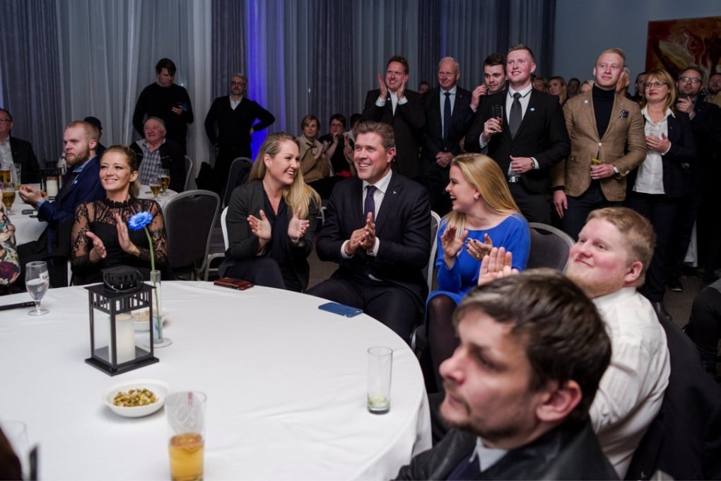 Iceland’s Prime Minister Bjarni Benediktsson (centre) celebrates with members of his Independence Party in Reykjavik. Photo: Reuters