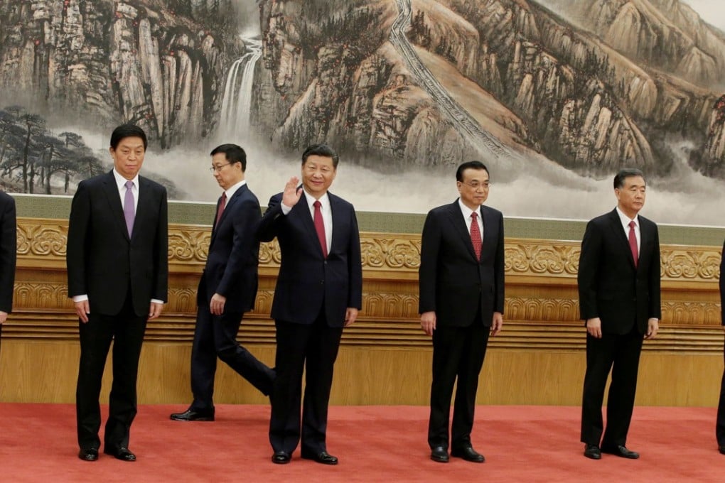 Chinese President Xi Jinping (centre) and other new Politburo Standing Committee members (from left) Wang Huning, Li Zhanshu, Han Zheng, Li Keqiang, Wang Yang, Zhao Leji at the Great Hall of the People in Beijing. Photo: Reuters/Jason Lee