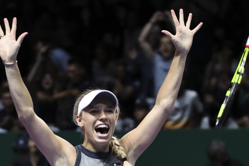 Caroline Wozniacki beats Venus Williams in the final of the WTA tournament in Singapore. Photo: AP