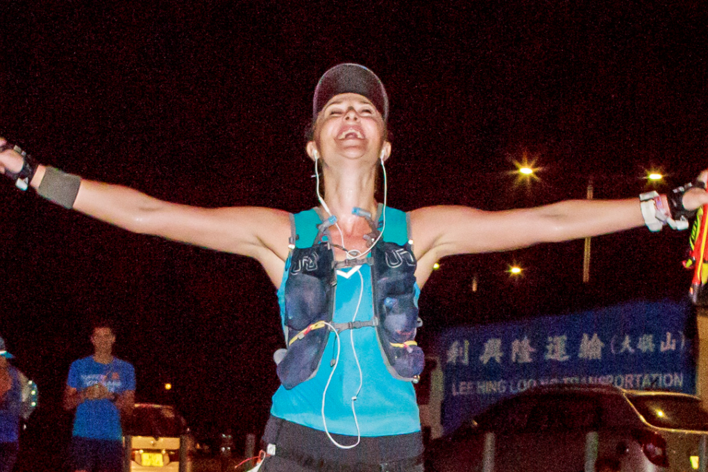Elsa Jean de Dieu crosses the finish line, using “the power of now” to win. Photos: Lantau Base Camp