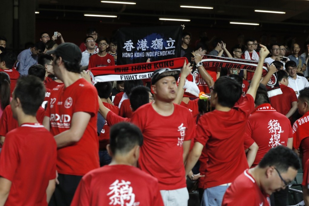 Fans of the home team boo the national anthem and display pro-independence banners during their AFC Asian Cup 2019 qualifying soccer match against Malaysia, in Hong Kong on October 10. Photo: AP