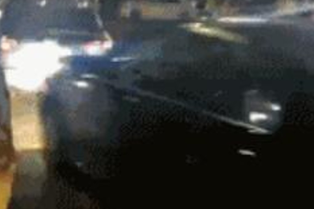 A still from the video footage shows the driver ramming the car out of the way. Photo: Handout