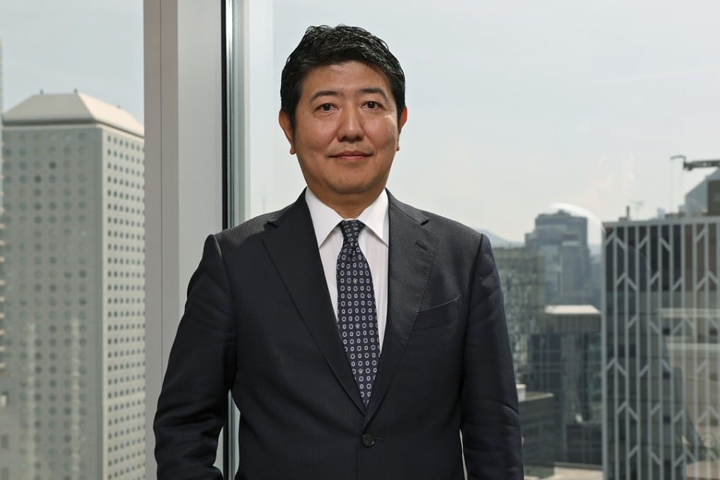 Spring Asset Management chairman Toshihiro Toyoshima said its recent purchase of 84 retail properties across the UK would provide 15 years of guaranteed income. Photo: Edward Wong