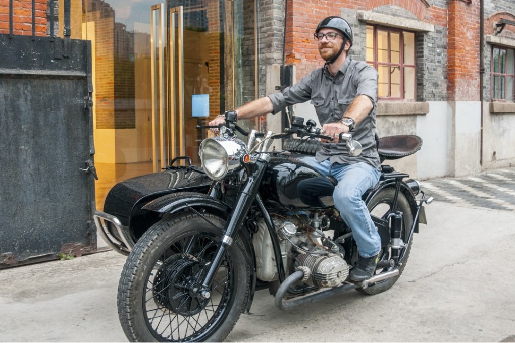 Shanghai Insiders guide Arthur Humeau on his Chang Jiang 750 motorcycle. Photo: Mark Andrews