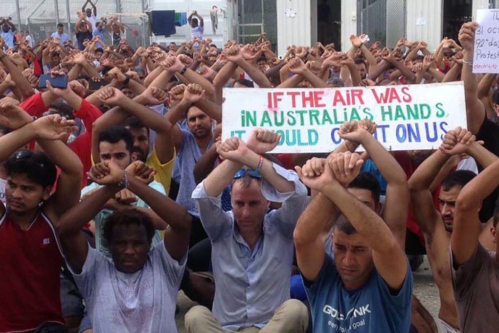Hundreds of asylum seekers were refusing to leave an Australian detention camp in Papua New Guinea that authorities closed Tuesday, citing fears for their safety, despite food, water and electricity being cut off. Photo: AFP