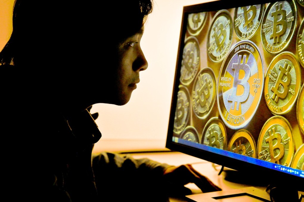 A Chinese bitcoin customer, The country’s ban on bitcoin and other cryptocurrencies buying using yuan came into effect on September 30, and the final date for exchanges to halt trading services in October 31. Photo: Imaginechina