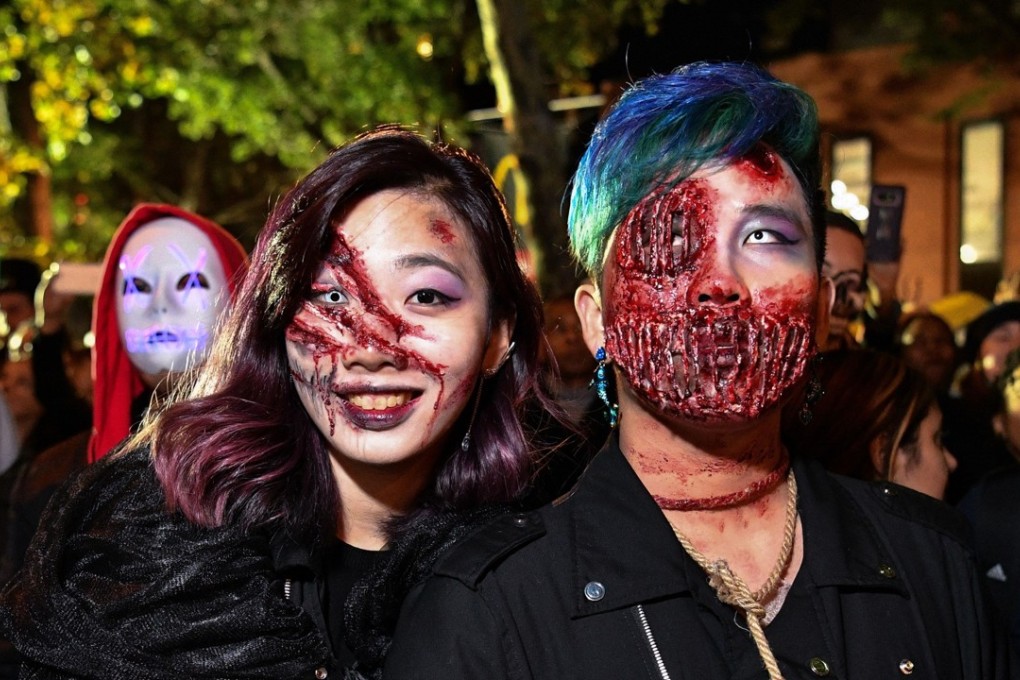 Revellers attend the 44th Annual Village Halloween Parade in New York. Photo: AFP