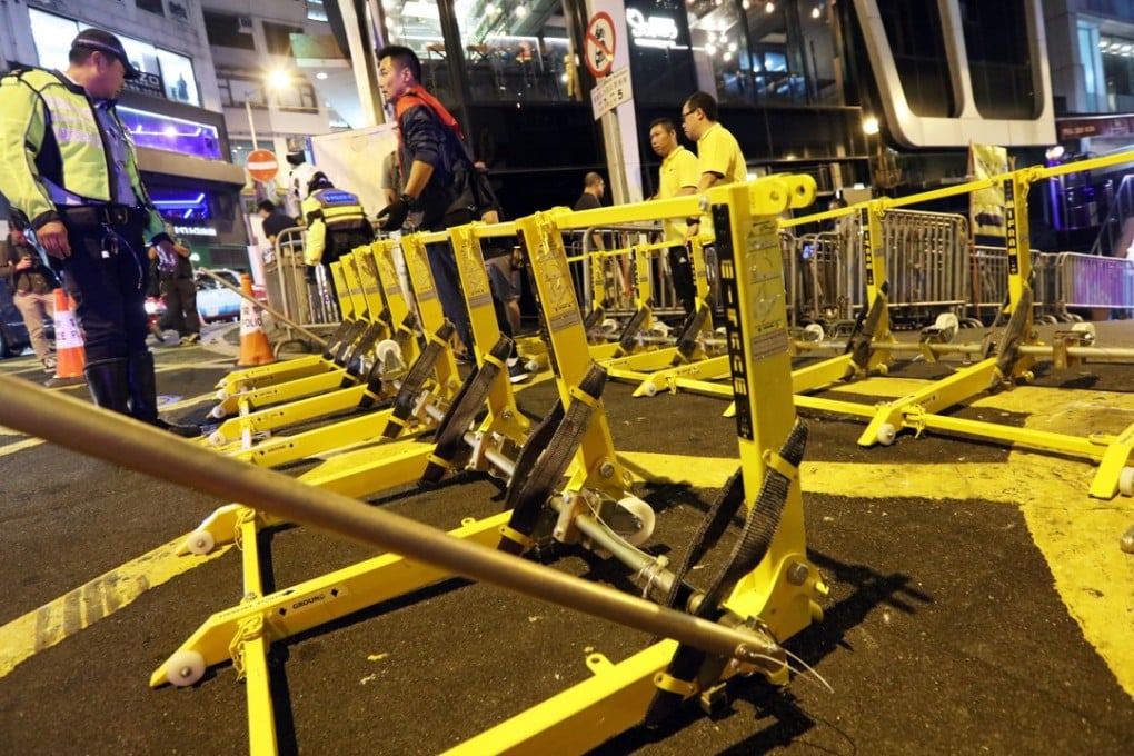 Police set up barriers at Lan Kwai Fong in Central. Photo: Felix Wong