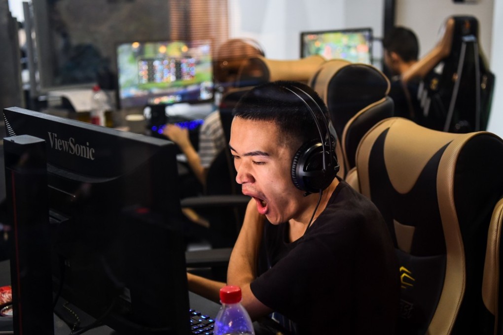 An eSports gamer plays League of Legends during training for the League of Legends World Championship at a boot camp in Shanghai on September 20. Once dismissed as the pursuit of teens and introverts, eSports is growing fast towards being a billion-dollar industry and has a huge fan base, especially in Asia. Photo: AFP