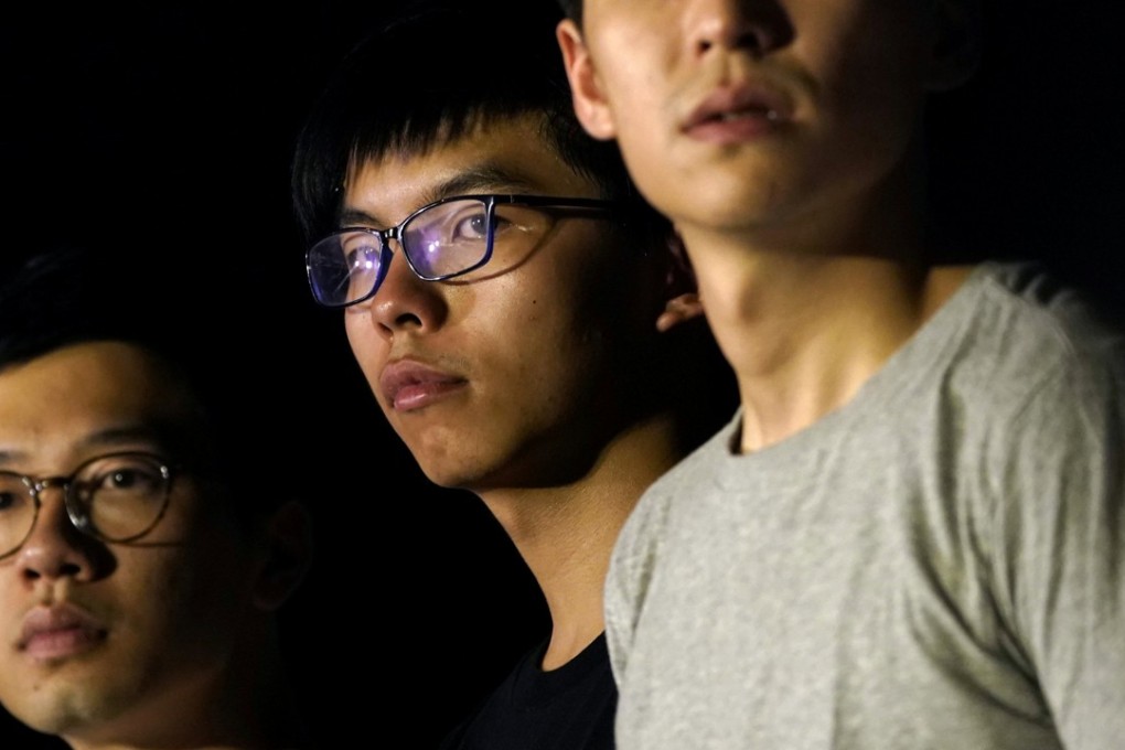 Student democracy activists Nathan Law and Joshua Wong, who were jailed for their roles in the 2014 Occupy protests. Photo: Reuters