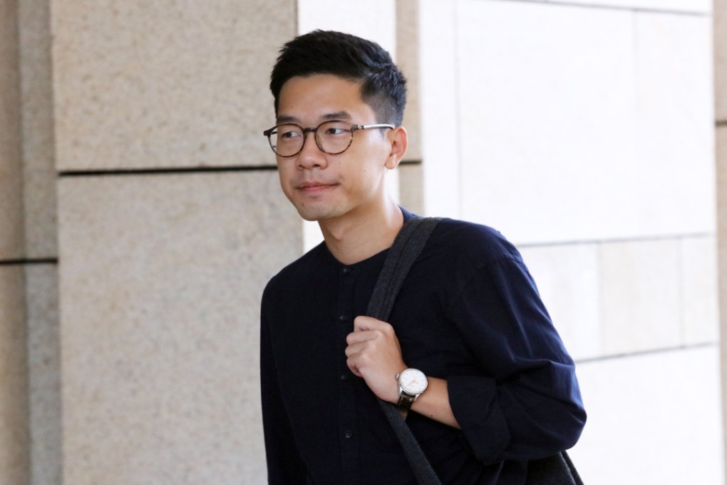 Nathan Law testified at the West Kowloon Court against a group who allegedly mobbed and beat him at the Hong Kong International Airport in January. Photo: Felix Wong