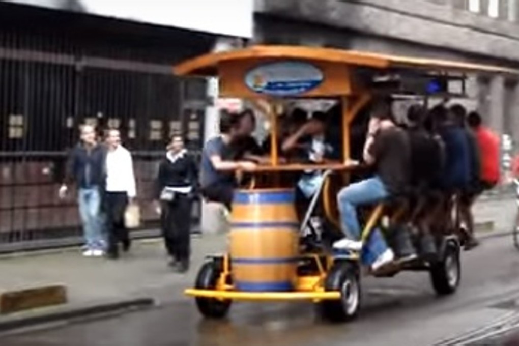 Beer bicycles have become a popular way – especially for tourists celebrating group events, such as stag parties – to travel around Amsterdam. They will be banned from this week. Photo: YouTube