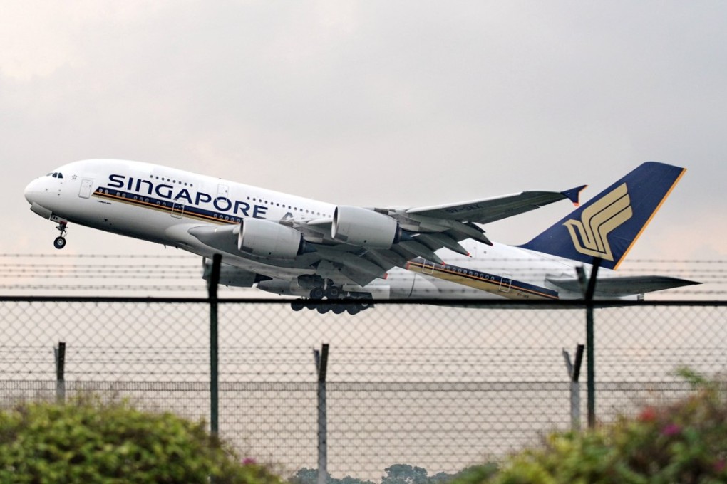Singapore Airlines Airbus A380 plans to upgrade its current fleet, despite the drop in profits. Photo: AFP Photo