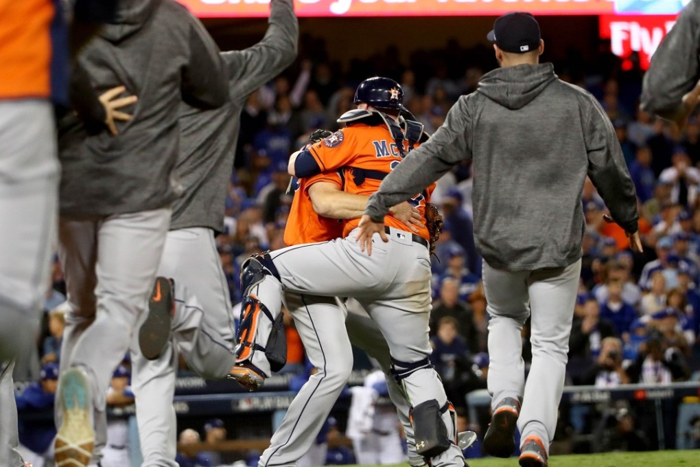 Charlie Morton and Brian McCann of the Houston Astros celebrate after defeating the Los Angeles Dodgers in game seven to claim the World Series. Photo: AFP