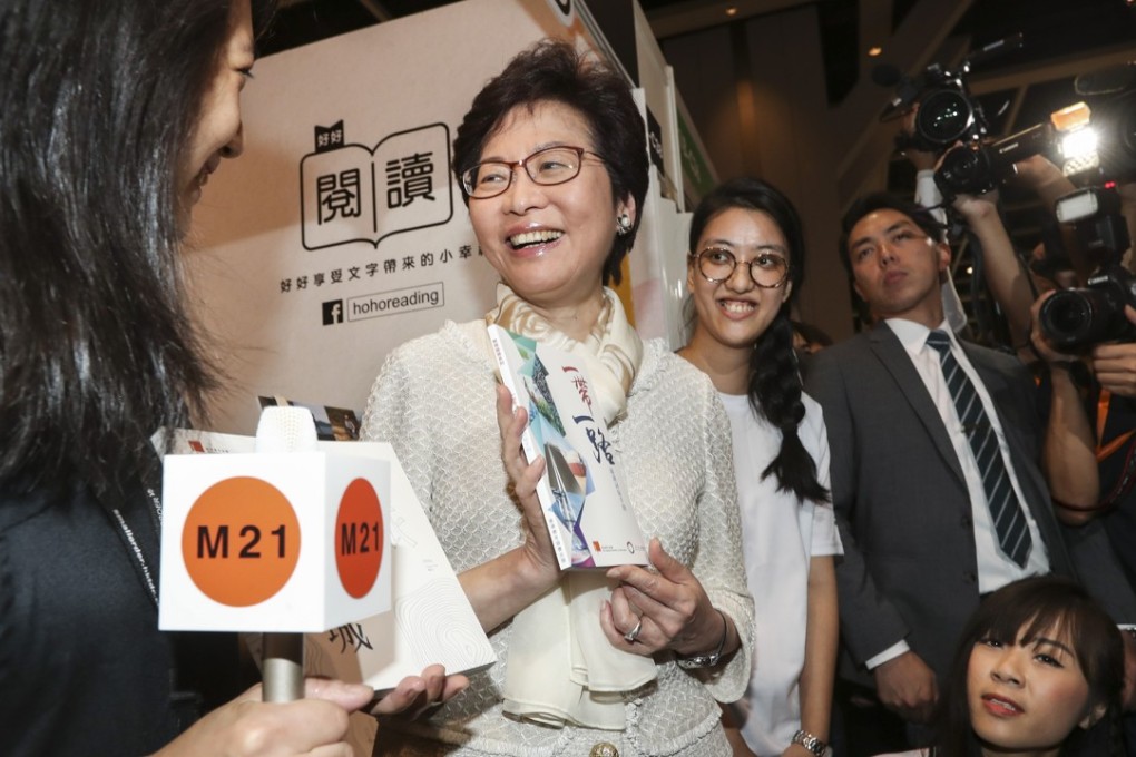 Hong Kong Chief Executive Carrie Lam visits the Hong Kong Federation of Youth Groups booth during the Book Fair at the Hong Kong Convention and Exhibition Centre in July. Photo: Nora Tam
