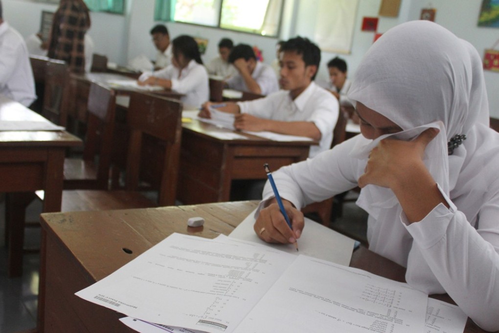 File photo of high school students taking the national examination in Malang in eastern Java island. Photo: AFP
