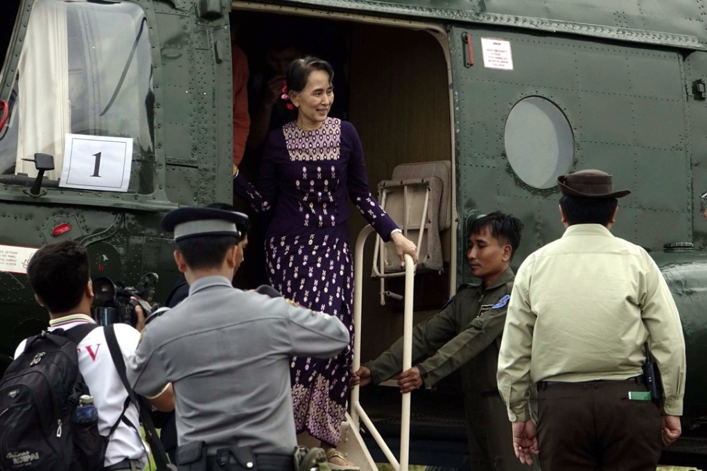 Myanmar state counsellor Aung San Suu Kyi arriving back at Sittwe Airport after visiting Maungdaw, Rakhine State. Photo: EPA