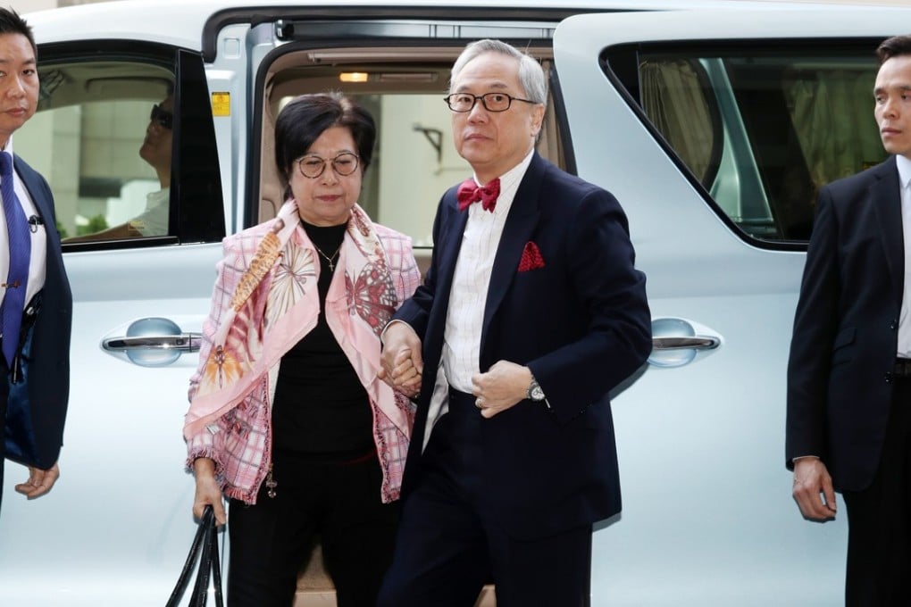 Former chief executive Donald Tsang (centre) with his wife, Selina Tsang Pou Siu-mei, at the High Court. Photo: K.Y. Cheng
