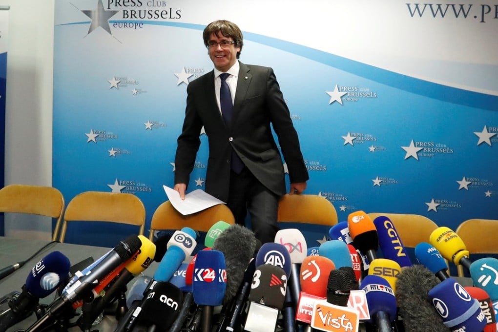 Sacked Catalan leader Carles Puigdemont arrives for a news conference at the Press Club Brussels Europe in Brussels, Belgium, on Tuesday. Photo: Reuters