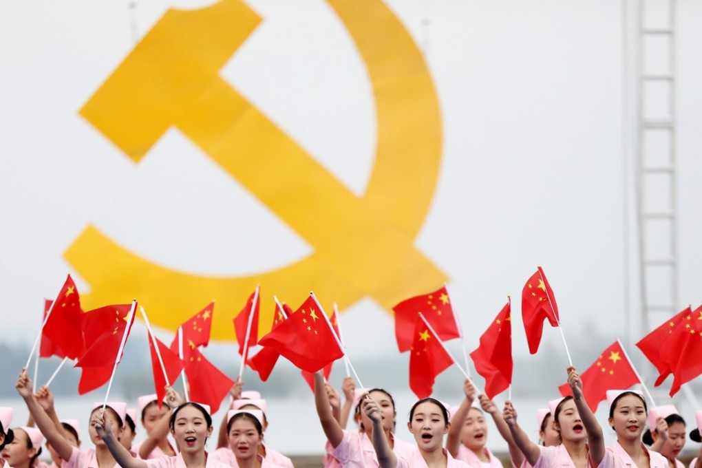 This photo taken on October 13, 2017 shows people performing to welcome the upcoming 19th Party Congress in Huaibei in China's eastern Anhui province. China's Communist Party opens its 19th National Congress on October 18, a twice-a-decade political meeting to reshuffle leadership positions. Photo: AFP