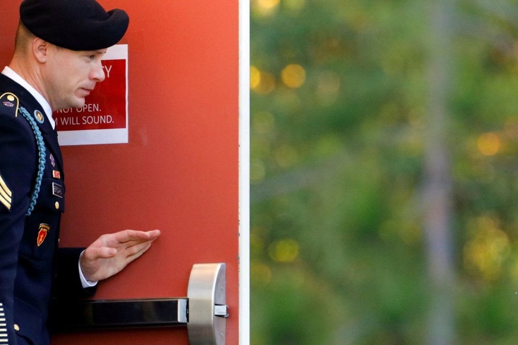 Bowe Bergdahl walks out of the courthouse after the judge said he would continue deliberating on his sentence during the court martial at Fort Bragg, North Carolina. Photo: Reuters